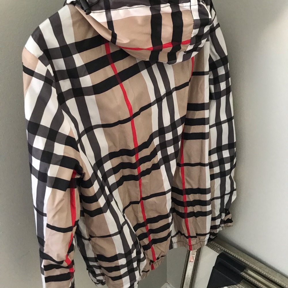 Burberry pattern hoodie rain jacket.
